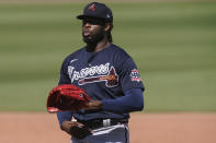 Atlanta Braves starting pitcher Touki Toussaint exhales in the third inning during a spring training baseball game against the Boston Red Sox on Monday, March 1, 2021, in Fort Myers, Fla. (AP Photo/Brynn Anderson)