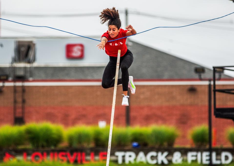 U of L's pole vaulter Aliyah Welter Gabriela Leon performs a pole vault jump during a practice at the Cardinal Track Stadium in Louisville, Ky on July 9, 2022.