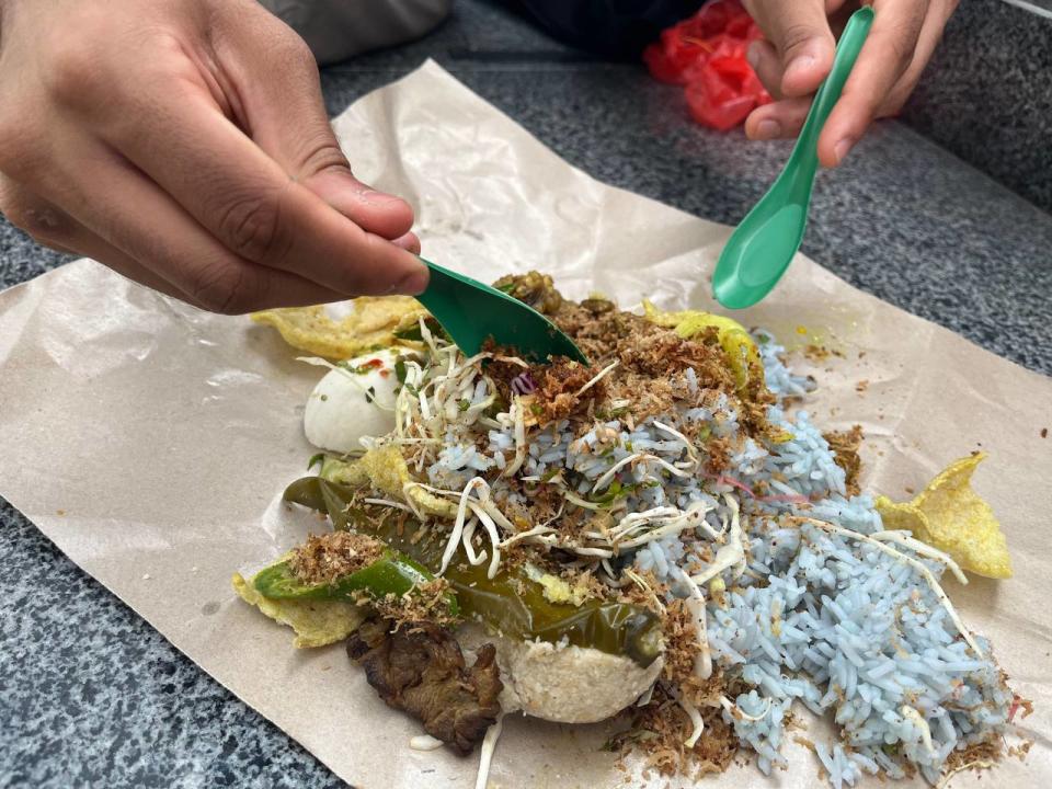 Nasi Kerabu Mek - close up of digging in