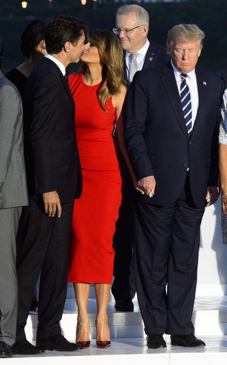 Prime Minister Justin Trudeau greets Melania Trump as she arrives for a family photo with President Donald Trump, during the G7 Summit in Biarritz, France, Sunday, Aug. 25, 2019.  (Sean Kilpatrick/Pool via AP)