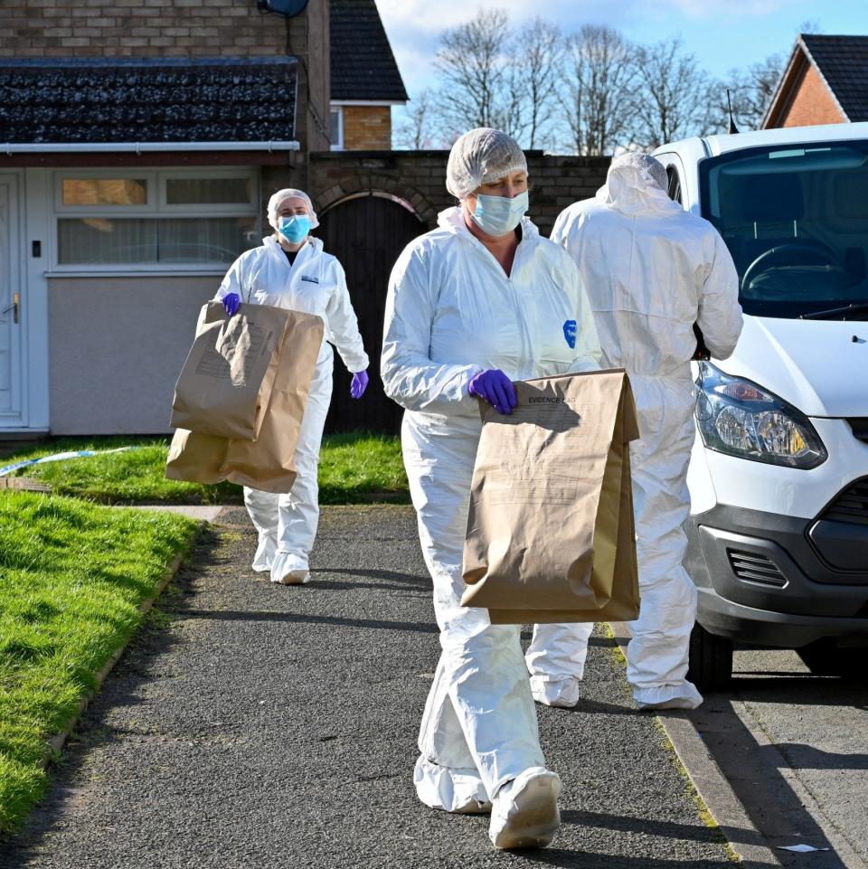 Forensic teams at the scene of the murder investigation at an address in Haresfield Close