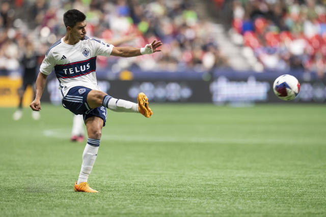 Gauld's late PK goal helps Whitecaps tie Sporting KC 1-1