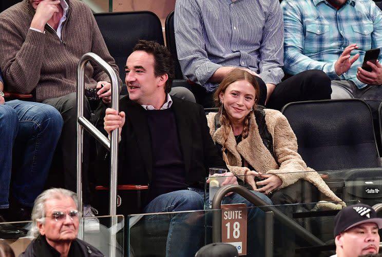 Mary-Kate Olsen and Olivier Sarkozy attend the New York Knicks vs. Brooklyn Nets game at Madison Square Garden on November 9, 2016 in New York City. 