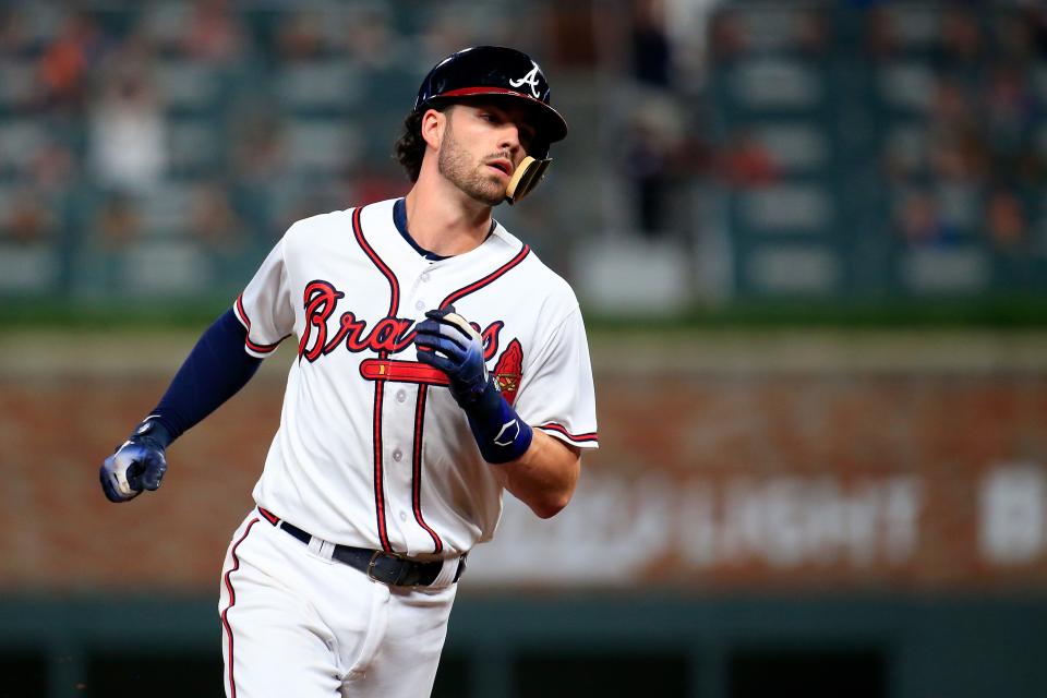 ATLANTA, GA - AUGUST 15: Dansby Swanson #7 of the Atlanta Braves rounds the bases after a home run during the fourth inning against the Miami Marlins at SunTrust Park on August 15, 2018 in Atlanta, Georgia. (Photo by Daniel Shirey/Getty Images)