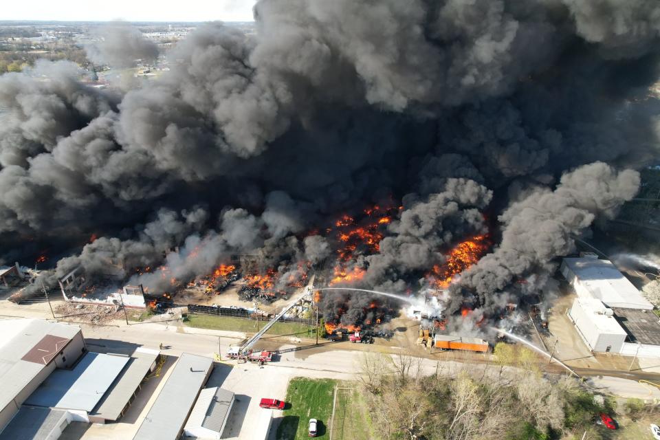 Smoke rises from an industrial fire April 11, 2023, at 358 NW F St. in Richmond.