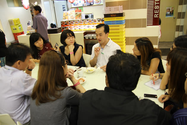 People's Action Party candidate Koh Poh Koon speaks to residents at Rivervale Mall during a walkabout on Sunday, 13 January. (Yahoo! photo)