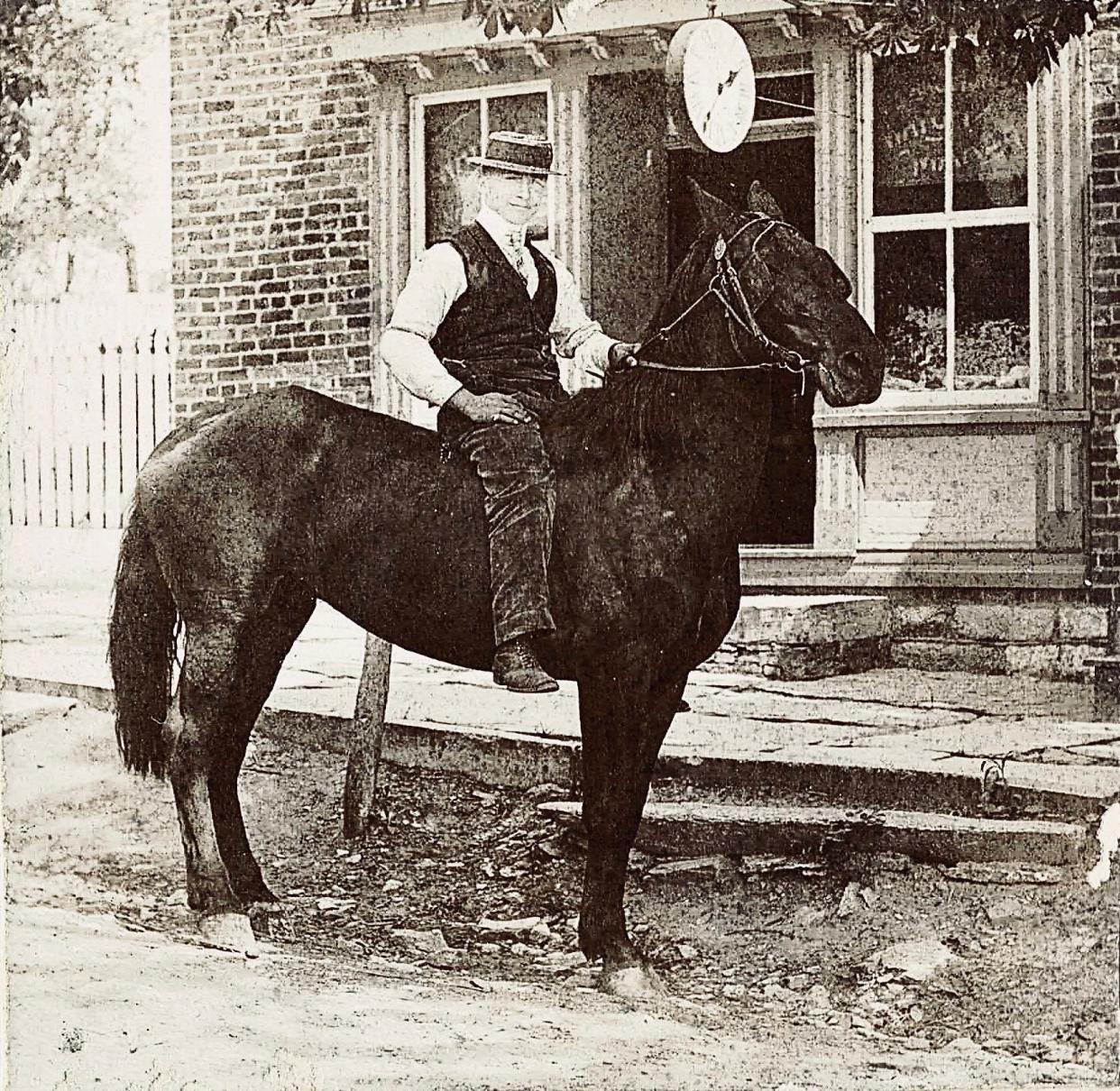Keedysville man on horseback in front of E. E. Wyand's Clock Repair Shop, ca. late 19th century. Horses were essential; they pulled barges, fire engines, mail coaches, farm equipment and hearses.
