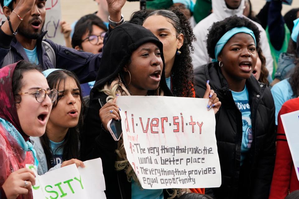 Protestors gathered outside as the U.S. Supreme Courts heard oral arguments in two affirmative action college admission cases in October.