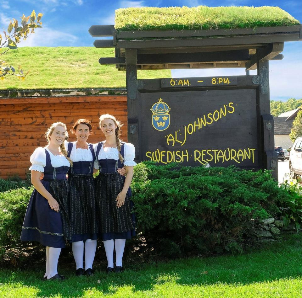 Wait staff at Al Johnson's Swedish Restaurant & Butik in Sister Bay are decked out in the Scandinavian-style dirndls, or folk dresses, they wear while working.