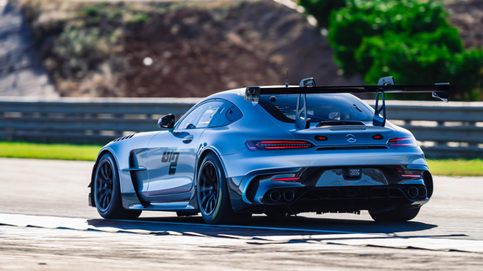 Driving the 2024 Mercedes-AMG GT2 race car on track.