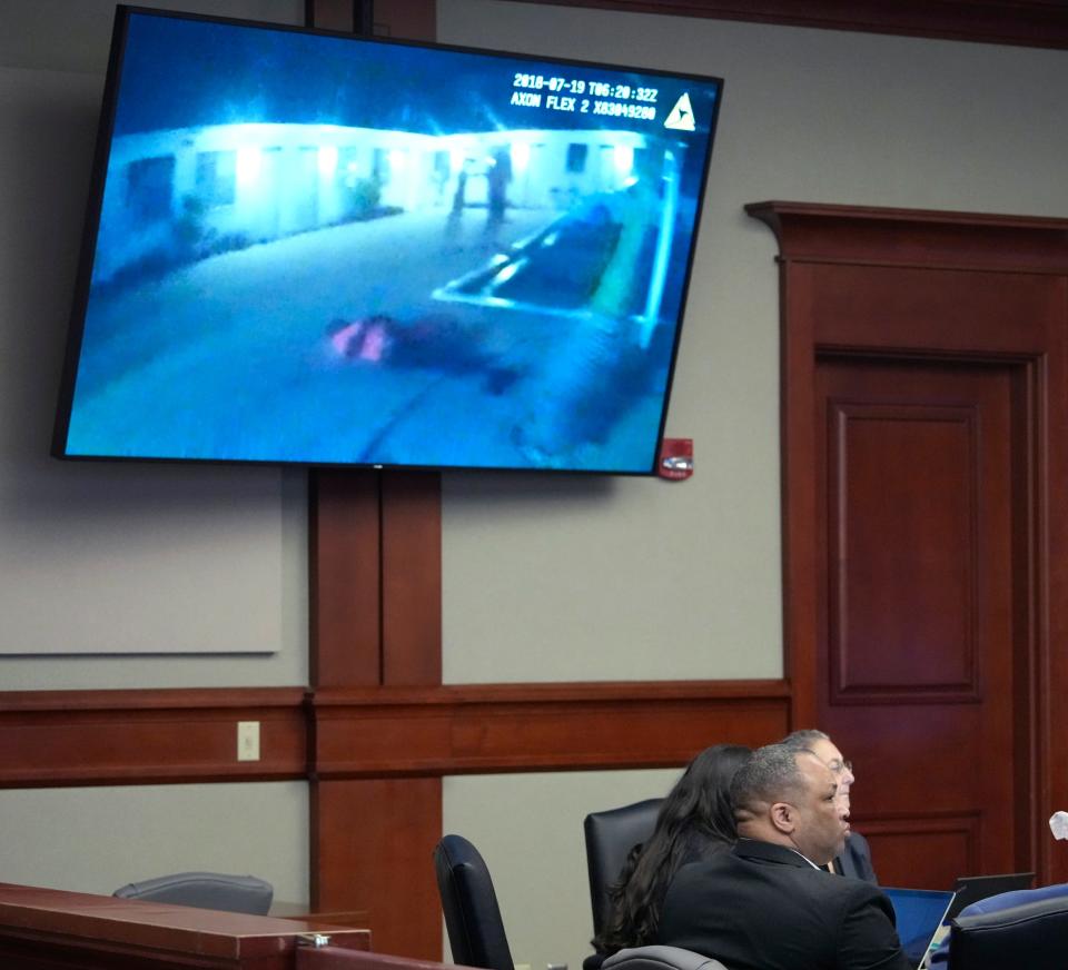 Police body cam video plays during the Marcus Pinckney murder trial in DeLand, Friday, Dec. 2, 2022.