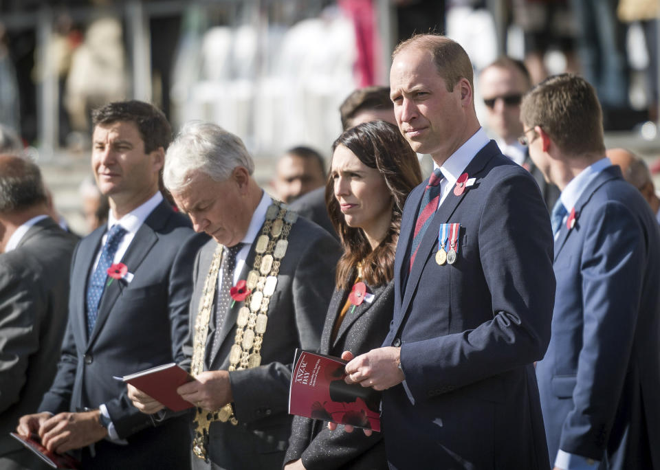 Britain's Prince William, front right, and New Zealand's Prime Minister Jacinda Ardern, second right in front, attend an Anzac Day service at Auckland War Memorial Museum in Auckland, New Zealand Thursday, April 25, 2019. (Mark Tantrum/The New Zealand Government via AP)