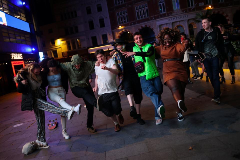 People dance and socialise in Soho: REUTERS