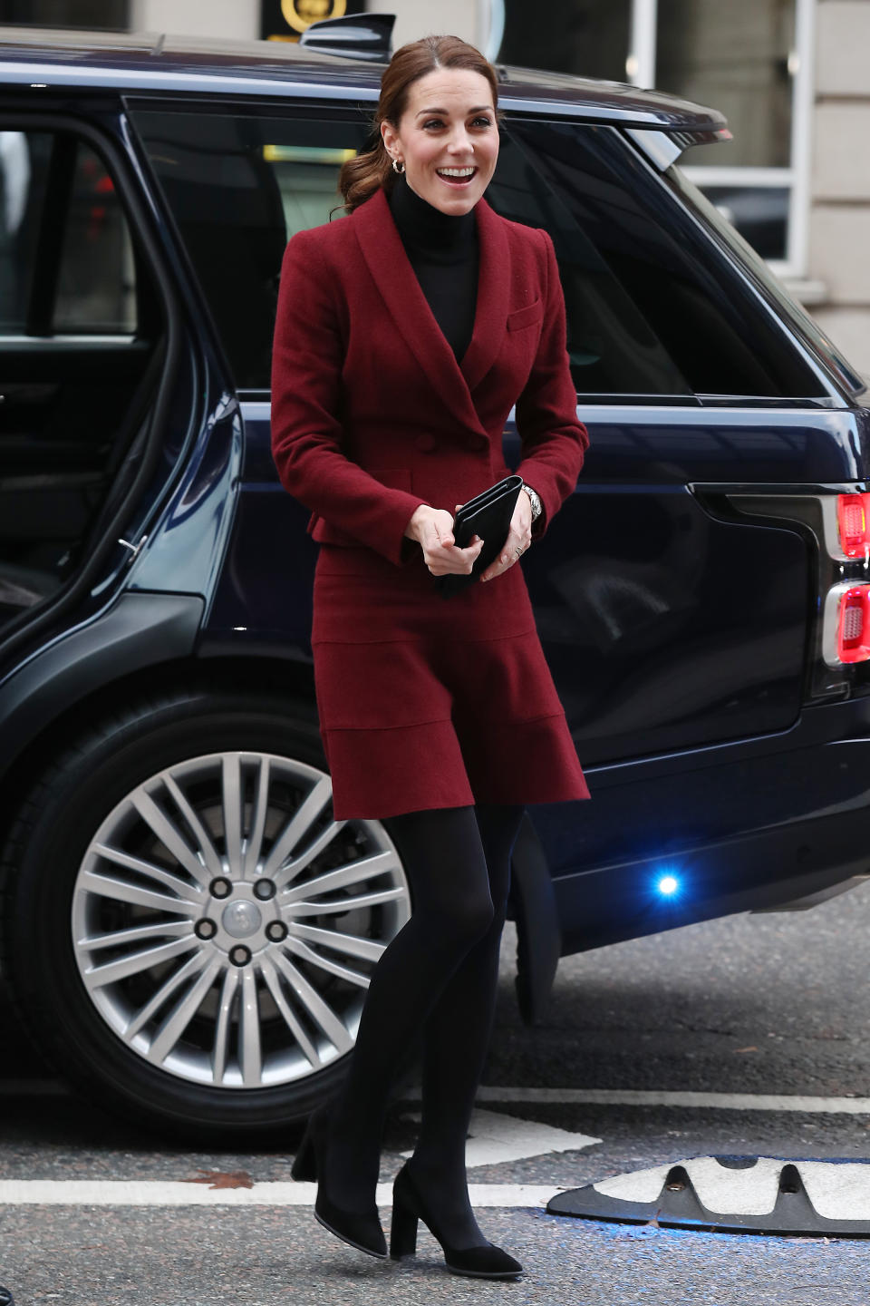 Kate wore a burgundy skirt suit by Paule Ka (Getty)