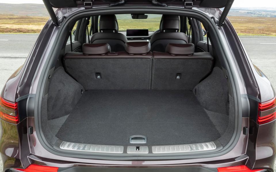 The boot is roughly on a par with its rivals in size, but the sloping rear glass means it isn’t quite as useful for big, bulky items - Genesis 