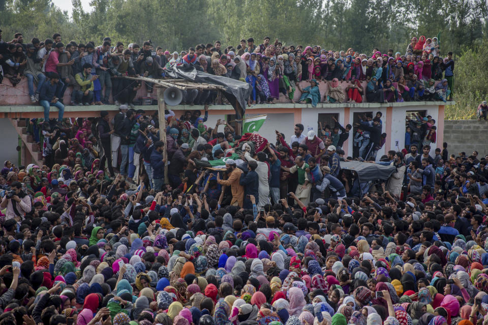 Kashmiri villagers carry body of top rebel commander Gulzar Ahmed Paddroo during his funeral procession in Aridgeen, about 75 kilometers south of Srinagar, Indian controlled Kashmir, Saturday, Sept 15, 2018. Indian troops laid a siege around a southern village in Qazigund area overnight on a tip that militants were hiding there, police said. A fierce gunbattle erupted early Saturday, and hours later, five local Kashmiri rebels were killed. (AP Photo/Dar Yasin)