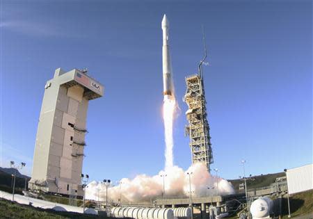 An Atlas 5 ULA (United Launch Alliance) rocket carrying a satellite for the Defense Meteorological Satellite Program is launched from Vandenberg Air Force Base in California April 3, 2014. REUTERS/Gene Blevins