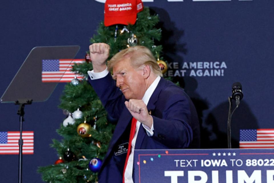 Former US President and 2024 presidential hopeful Donald Trump gestures during a campaign event in Waterloo, Iowa, on December 19, 2023 (AFP via Getty Images)