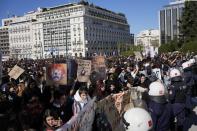 Protesters gather during a rally outside parliament in Athens, Greece on Thursday, Feb. 2, 2023. Performing artists and arts students are striking for a second day, closing theatres, halting television shoots and disrupting art school classes, to protest charges in the qualification system of civil service jobs. (AP Photo/Thanassis Stavrakis)