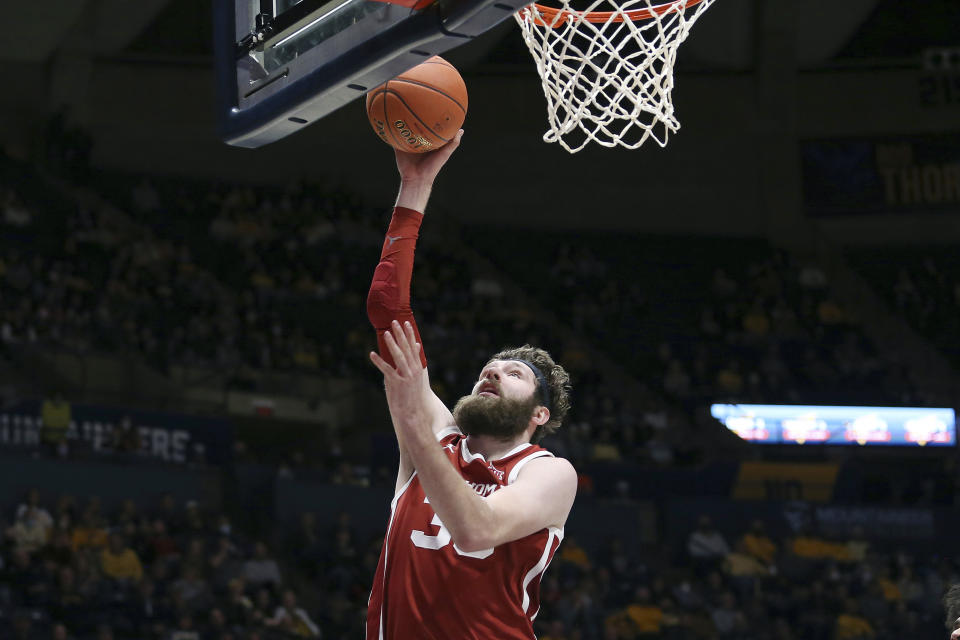 FILE - Oklahoma forward Tanner Groves shoots during the first half of an NCAA college basketball game against West Virginia in Morgantown, W.Va. on Jan. 26, 2022. The Sooners open the season on Nov. 7 at home against Sam Houston. (AP Photo/Kathleen Batten, File)