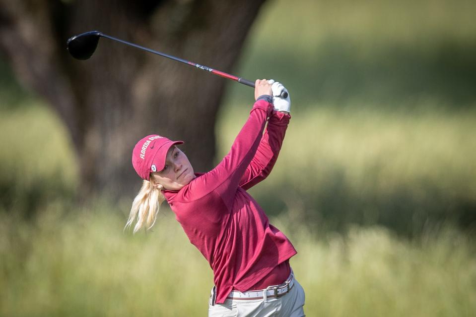 FSU senior golfer Beatrice Wallin finishes a shot during the Seminoles' appearance in the NCAA Tallahassee Regional at Seminole Legacy Golf Course.