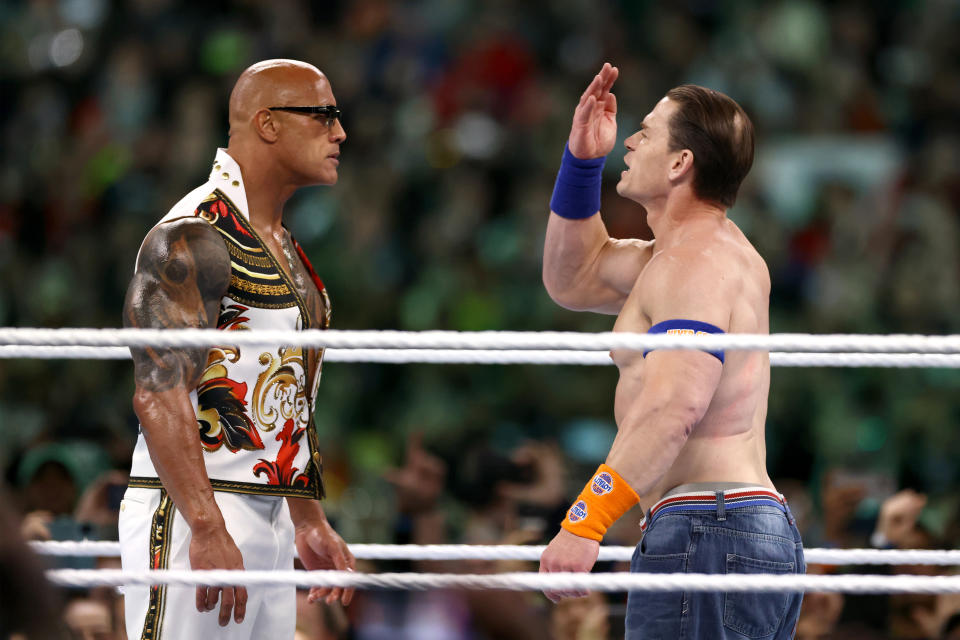 PHILADELPHIA, PENNSYLVANIA - APRIL 07: Dwayne "The Rock" Johnson and John Cena fight during Night Two at Lincoln Financial Field on April 07, 2024 in Philadelphia, Pennsylvania. (Photo by Tim Nwachukwu/Getty Images)