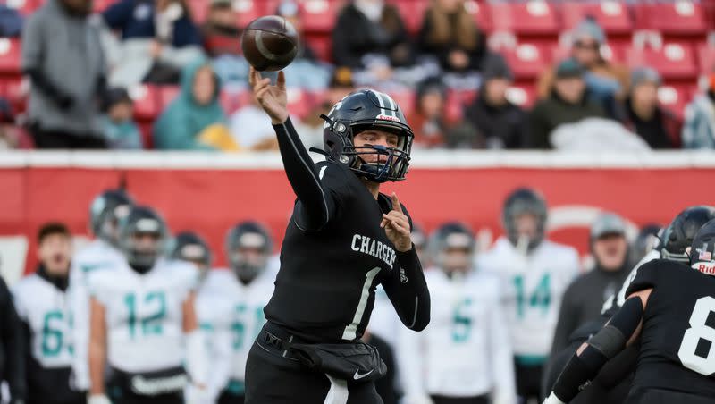 Corner Canyon quarterback Isaac Wilson throws during a 6A football semifinal game against Farmington at Rice-Eccles Stadium in Salt Lake City on Thursday, Nov. 10, 2022.