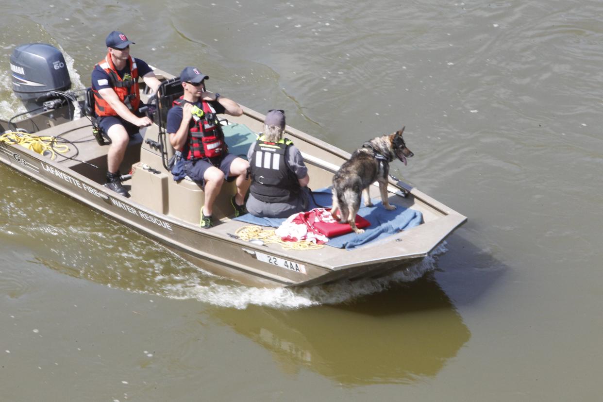 Lafayette Fire Department's water rescue team members along with other agencies searched the Wabash River Friday, July 7, 2023, looking for the remains of the 31-year-old, Purdue-affiliated man who jumped from Lafayette's pedestrian bridge about 2:30 a.m. Monday, July 3, 2023.