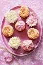 <p>You can never go wrong with a classic cupcake, and these easy-to-make frosted treats make the perfect Easter centerpiece.</p><p>Get the <strong><a href="https://www.womansday.com/food-recipes/a32332125/flower-cupcakes-recipe/" rel="nofollow noopener" target="_blank" data-ylk="slk:Flower Cupcakes recipe.;elm:context_link;itc:0;sec:content-canvas" class="link ">Flower Cupcakes recipe.</a></strong></p>