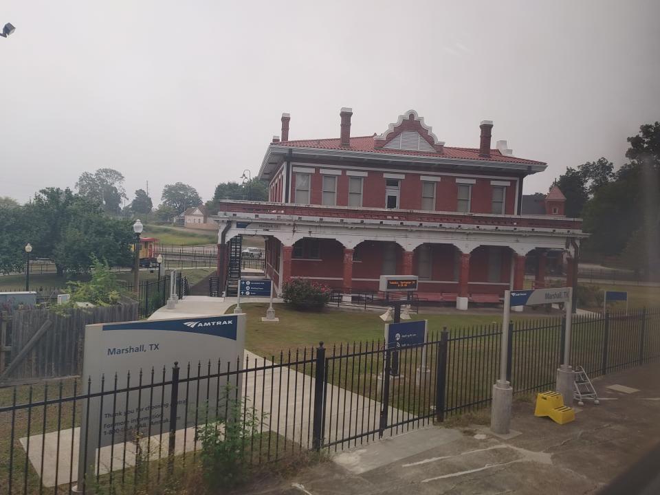 view of a texas train station out of an amtrak window