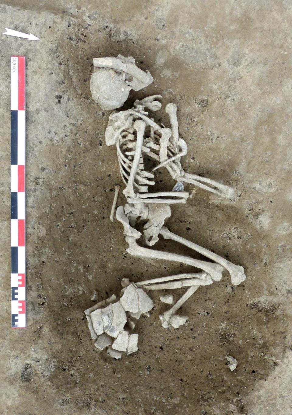 The deceased was found with various rare animal bone adornments, archaeologists said.