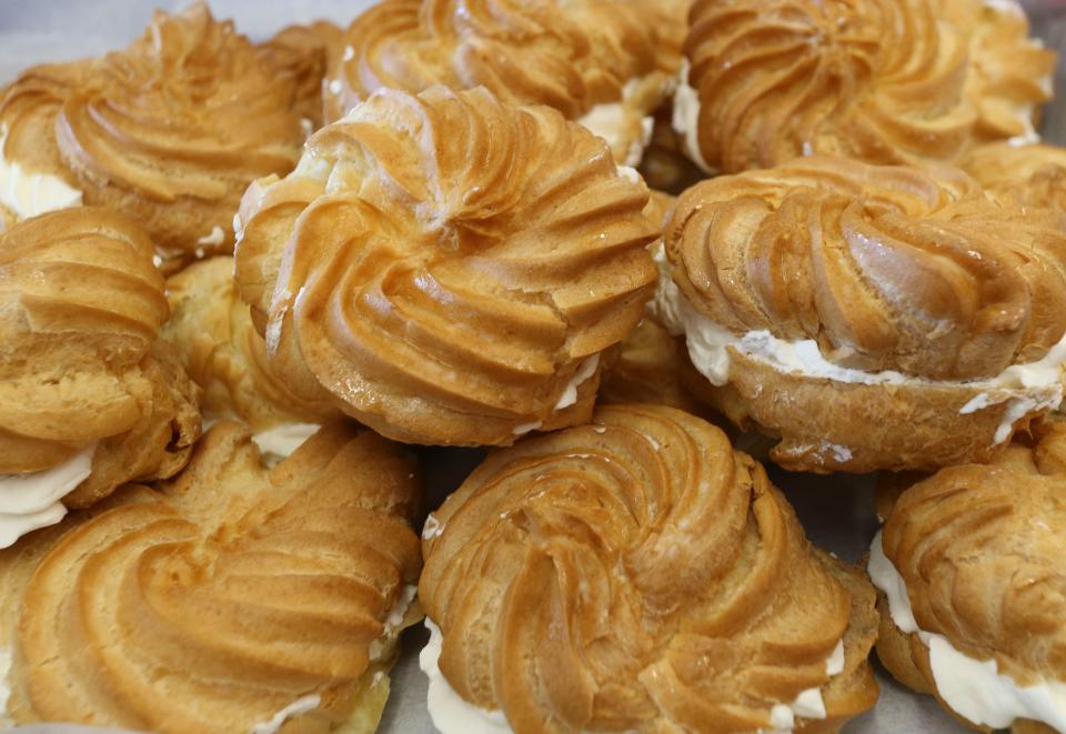 Rolf Meyer has opened Rolf's Deli and Sausages on Highway 43 in Northport featuring German foods and baked goods. A tray of creme filled pastries is seen Wednesday, February 3, 2021. [Staff Photo/Gary Cosby Jr.]