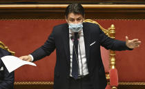 Premier Giuseppe Conte delivers his speech at the Senate, in Rome, Tuesday, Jan. 19, 2021. Conte fights for his political life with an address aimed at shoring up support for his government, which has come under fire from former Premier Matteo Renzi's tiny but key Italia Viva (Italy Alive) party over plans to relaunch the pandemic-ravaged economy. (Andreas Solaro/Pool via AP)