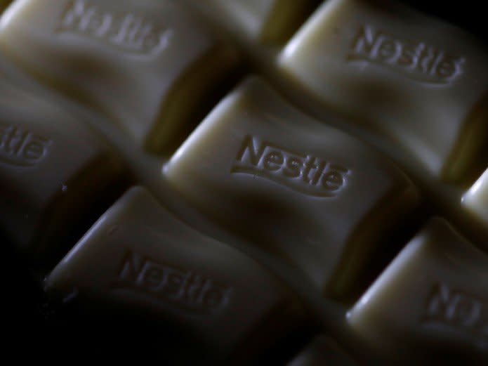A Nestle company logo is pictured on a bar of Milky Bar chocolate in Manchester, Britain April 25, 2017. REUTERS/Phil Noble