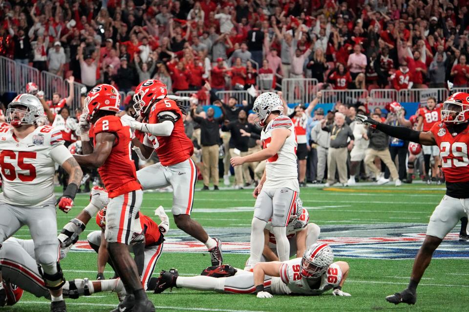 Dec 31, 2022; Atlanta, Georgia, USA;  Ohio State Buckeyes place kicker Noah Ruggles (95) misses a 50 yard field goal in the final seconds of the second half of the Peach Bowl against the Georgia Bulldogs in the College Football Playoff semifinal at Mercedes-Benz Stadium. Mandatory Credit: Adam Cairns-The Columbus Dispatch