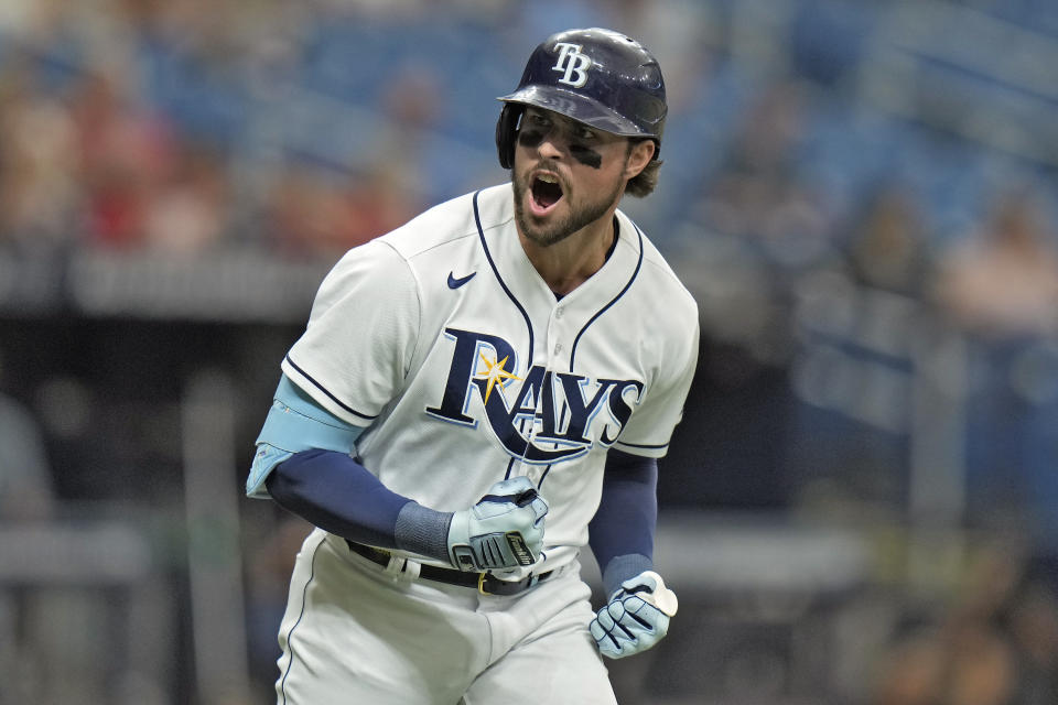 Tampa Bay Rays' Josh Lowe reacts after hitting a two-run home run off Colorado Rockies relief pitcher Matt Koch during the eighth inning of a baseball game Thursday, Aug. 24, 2023, in St. Petersburg, Fla. (AP Photo/Chris O'Meara)