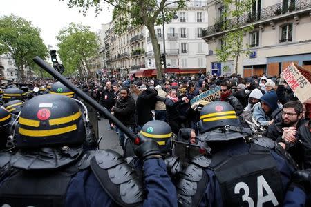 French riot police face off with demonstrators the day after the country went to the polls, in Paris, France, May 8, 2017. REUTERS/Jean-Paul Pelissier