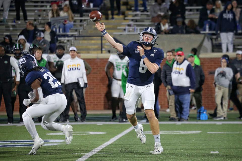 Georgia Southern quarterback Kyle Vantrease (6) passes while running back Jalen White (25) stays in to block against Marshall on Nov. 19, 2022 at Paulson Stadium in Statesboro.