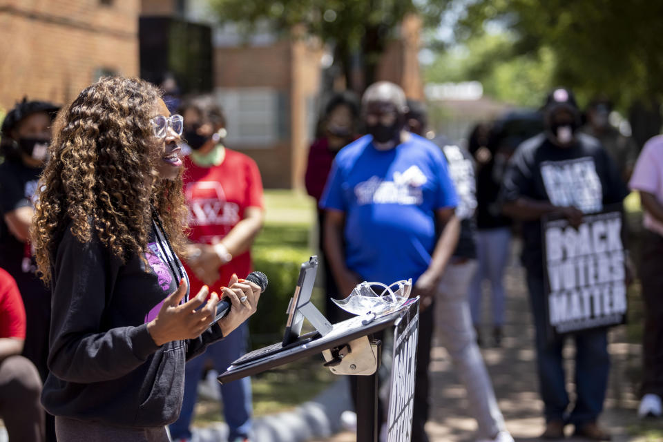 Jessica Fortune Barker, cofounder of Lift Our Vote, speaks about voting rights during the John Lewis Advancement Act Day of Action, a voter education and engagement event Saturday, May 8, 2021, in front of Brown Chapel A.M.E. Church in Selma, Ala. (AP Photo/Vasha Hunt)