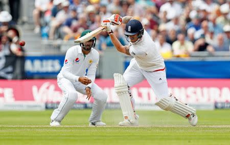 Britain Cricket - England v Pakistan - Second Test - Emirates Old Trafford - 23/7/16 England's Ben Stokes hits a four Action Images via Reuters / Jason Cairnduff Livepic