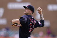 Cleveland Guardians starting pitcher Zach Plesac throws during the first inning of a baseball game against the Detroit Tigers, Thursday, Aug. 11, 2022, in Detroit. (AP Photo/Carlos Osorio)