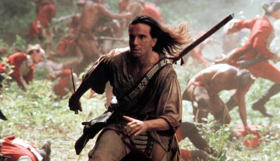 <p>Day-Lewis shifted gear once again here, with his only action hero role. Directed by Michael Mann, this adaptation of James Fenimore Cooper’s classic novel is one of the greatest adventure films ever made, thanks in no small part to Day-Lewis’s performance as the heroic Hawkeye, and his intense romantic chemistry with Madeleine Stowe’s Cora. (Picture credit: 20th Century Fox) </p>