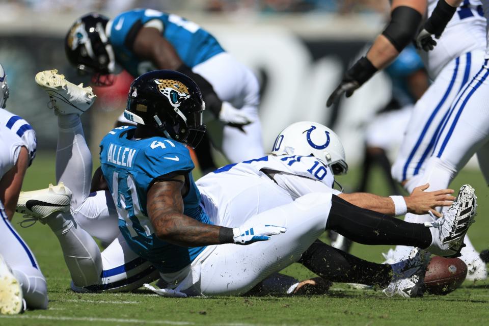 Jaguars' pass-rusher Josh Allen (41) strip-sacks Indianapolis Colts quarterback Gardner Minshew Sunday, the first of four turnovers the defense forced in a 37-20 victory at EverBank Stadium.