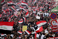 Followers of Shiite cleric Muqtada al-Sadr gather in Baghdad, Iraq, Friday, Jan. 24, 2020. Thousands of supporters of an influential, radical Shiite cleric gathered Friday in central Baghdad for a rally to demand that American troops leave the country amid heightened anti-US sentiment after a drone strike ordered by Washington earlier this month killed a top Iranian general in the Iraqi capital. (AP Photo)