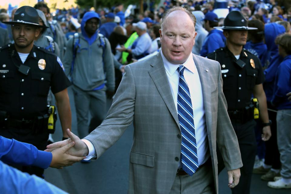 Kentucky’s coach Mark Stoops greets fans during the Cat Walk Saturday afternoon before the team faced South Carolina.Oct. 8, 2022 