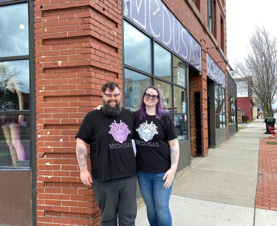 Kristy Gabel, right, and Randy Gill operate Medusas on lower Monroe Avenue. Gabel also works as a medical professional, a physician's assistant.