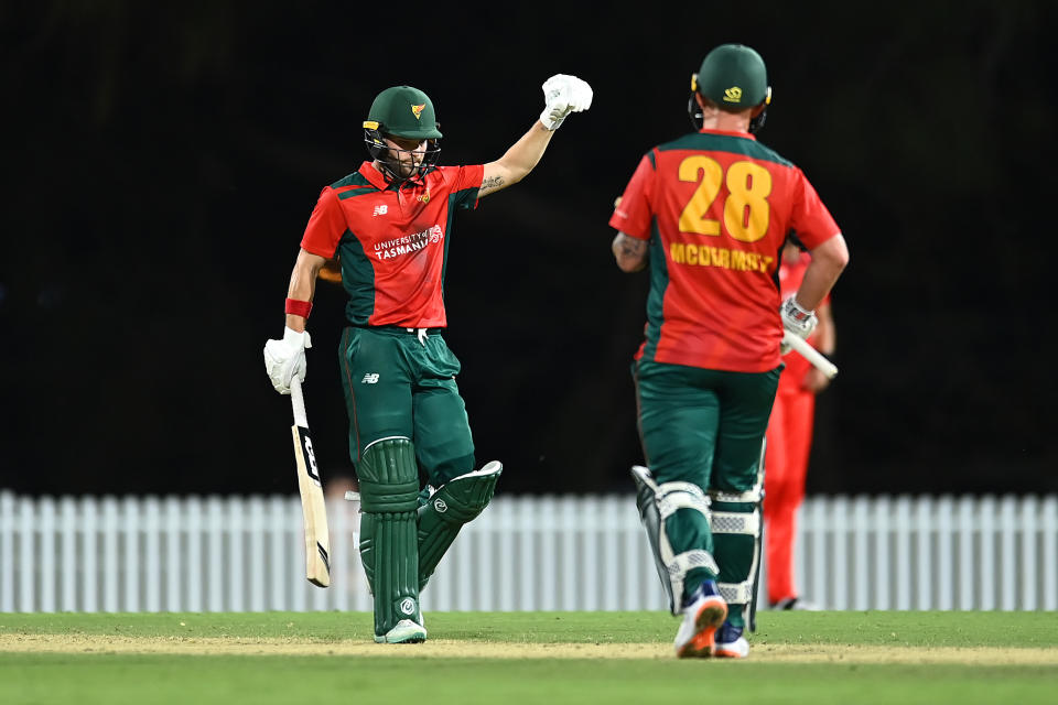 Caleb Jewell, pictured here after scoring the winning runs for Tasmania over South Australia.