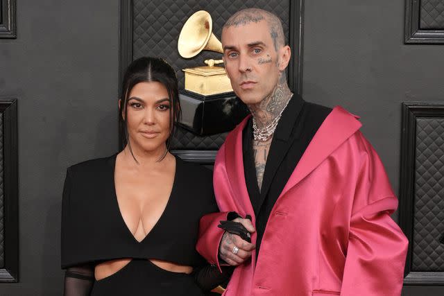 <p>Jeff Kravitz/FilmMagic</p> Kourtney Kardashian and Travis Barker at the Grammys in Las Vegas in April 2022