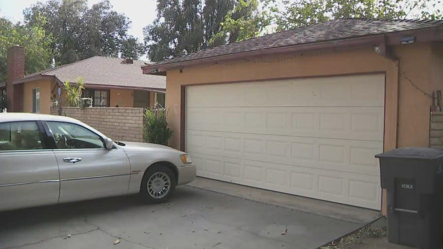 Bullet holes pictured on a home after Michael Rangel, a Riverside grandfather and veteran, was shot and killed on his front lawn on Oct. 28, 2023. (KTLA)