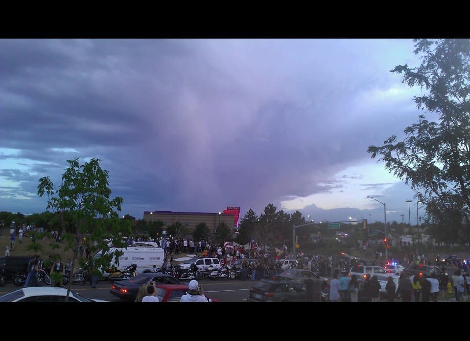 People viewing this image claim to see an angel above the scene of the Aurora, CO movie theater shooting. Credit: Crystal Fuller